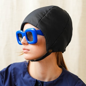 Pillow Puffer Quilted Aviator Helmet Cap Bonnet on a button in Black image 1