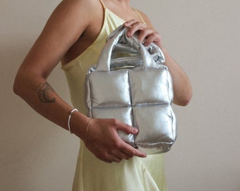MINI PILLOW PUFFER essentiële Dirol-tas in zilver, metallica; draagtas
