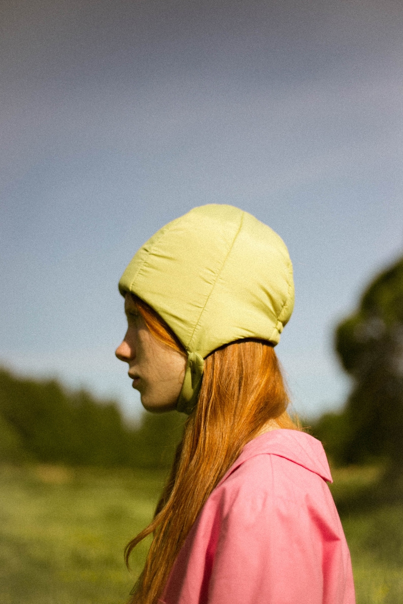 Pillow Puffer Quilted Aviator Helmet Cap Bonnet on a button in light Olive green image 4