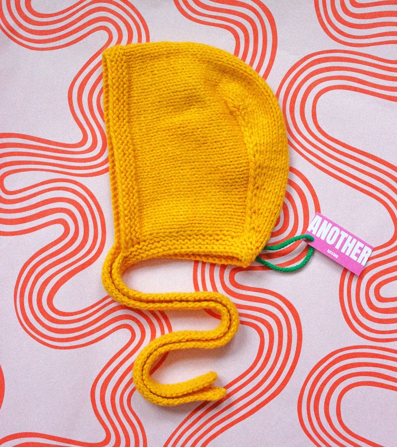Hand-knitted Adult Bow Tie Bonnet hat in Yellow image 2