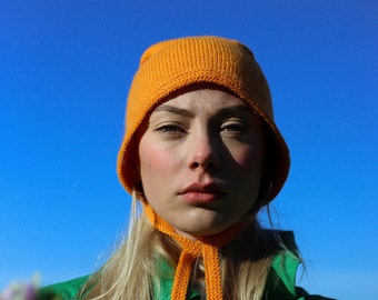 Hand-knitted Adult Bow Tie Bonnet hat in mandarin orange