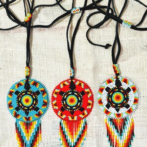 From Left to Right. Turquoise Turtle, Red Turtle, White Turtle.