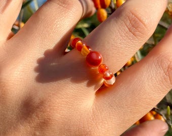 Vibrant Elastic Anti-Anxiety Ring Made from Natural Bold Orange Carnelian Beads with White Swirls
