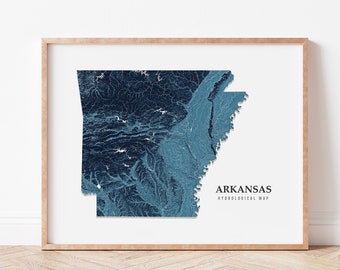 May include: A framed print of a blue and white hydrological map of Arkansas. The map is titled "Arkansas Hydrological Map".