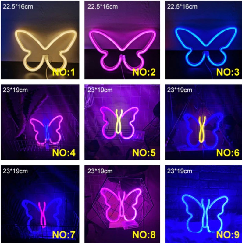 May include: A collection of neon butterfly signs in various colors, including white, pink, and blue. Each sign is a different size, with the largest measuring 23cm x 19cm. The signs are numbered 1 through 9.