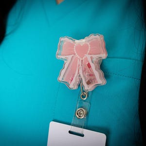 Coquette Bow Shaker Badge Reel