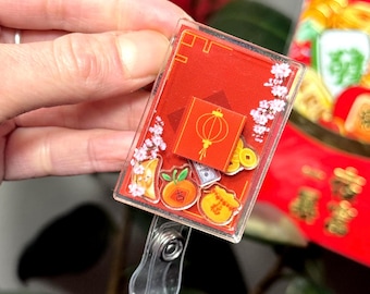Carrete de credencial con forma de sobre rojo