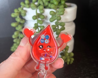 Blood buddy shaker badge reel