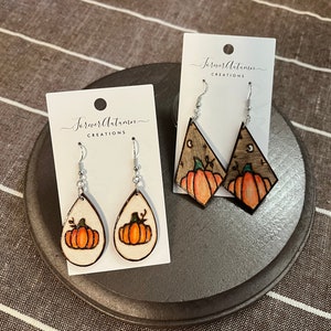 Handmade wood burned painted pumpkin earrings. Halloween/ fall / spooky