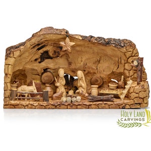 Wooden Nativity Scene in Manger carved inside of a Solid Piece of Olive wood Branch - Nativity Set for Christmas Made in the Holy Land