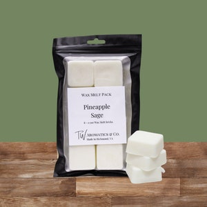 May include: A package of eight 0.3 ounce wax melt bricks in a white plastic bag. The wax melts are white and are labeled "Pineapple Sage" with the brand name "TW AROMATICS & CO. Made in Richmond, VA".