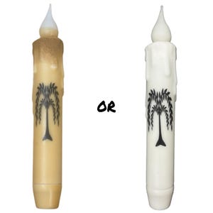 May include: Two battery-operated LED candles with a weeping willow tree design. The candle on the left is a beige color and the candle on the right is white.  The text "OR" is printed in black between the candles.
