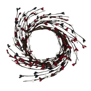 May include: A circular wreath composed of brown twigs adorned with red, white, and black berry-like accents. The berries are evenly spaced around the wreath, creating a decorative and festive appearance. This wreath is suitable for seasonal home decor.