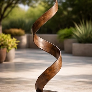 May include: Bronze abstract sculpture with a flowing, ribbon-like design. The sculpture is mounted on a square base and has a spiral shape. The artwork is displayed outdoors, with a blurred background of greenery.