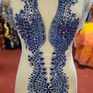 Light blue rhinestone bodice applique.