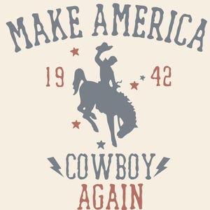 May include: Cream-colored graphic tee with the text "MAKE AMERICA COWBOY AGAIN." The design features a cowboy riding a bucking bronco, with the numbers "19" and "42" and star accents. The text and graphic are in shades of gray and red.