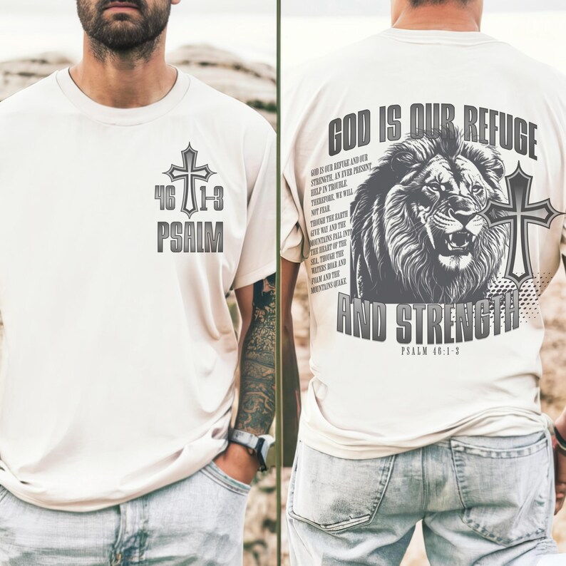 May include: Cream-colored t-shirt with a cross and the text "46:1-3 PSALM" on the front. The back features a lion graphic, a cross, and the words "GOD IS OUR REFUGE AND STRENGTH" with the scripture reference Psalm 46:1-3.