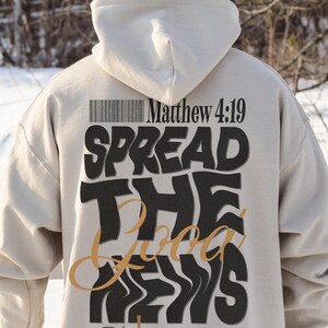 May include: A beige hoodie with a black and gold graphic print that says "Spread the Good News" and a barcode. The hoodie also has the text "Matthew 4:19" and "Come follow me Jesus said. And I will make you fishers of men."