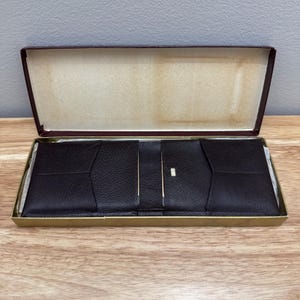 Cartera vintage de cuero Rolfs con caja de camafeo