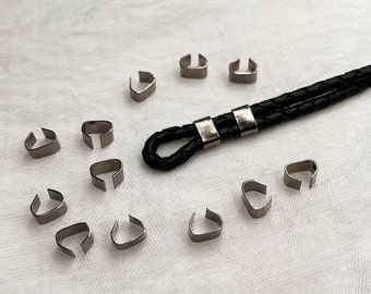 Perles à écraser en métal hématite jais : embouts en cuir repliés, 50 pièces
