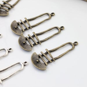 Antique Brass Shield Charms: Long Boho Tribal Pendants (55mm)