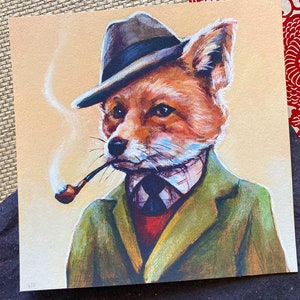May include: A painting of a fox wearing a brown fedora, a green jacket, a red scarf, and a blue tie. The fox is holding a pipe in its mouth and there is smoke coming from the pipe.
