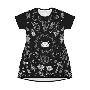 May include: Black t-shirt with a white print of various occult and mystical symbols, including a cat, snake, skull, and flowers.
