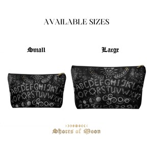 May include: Two black zippered pouches with a white ouija board design. The pouches are labeled "Small" and "Large".