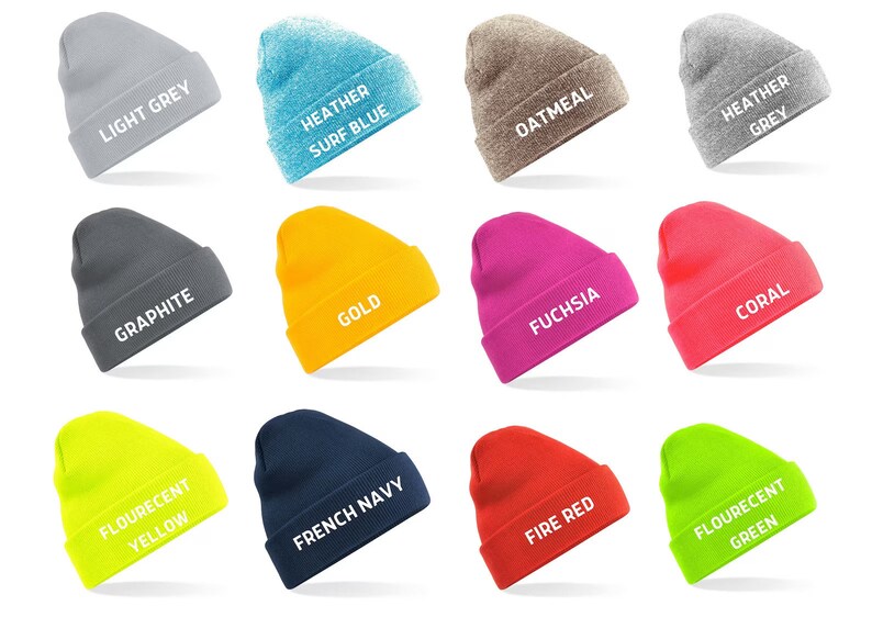 May include: A collection of twelve beanies in various colors, including light grey, heather surf blue, oatmeal, heather grey, graphite, gold, fuchsia, coral, flourescent yellow, french navy, fire red, and flourescent green. Each beanie has the color name printed in white.