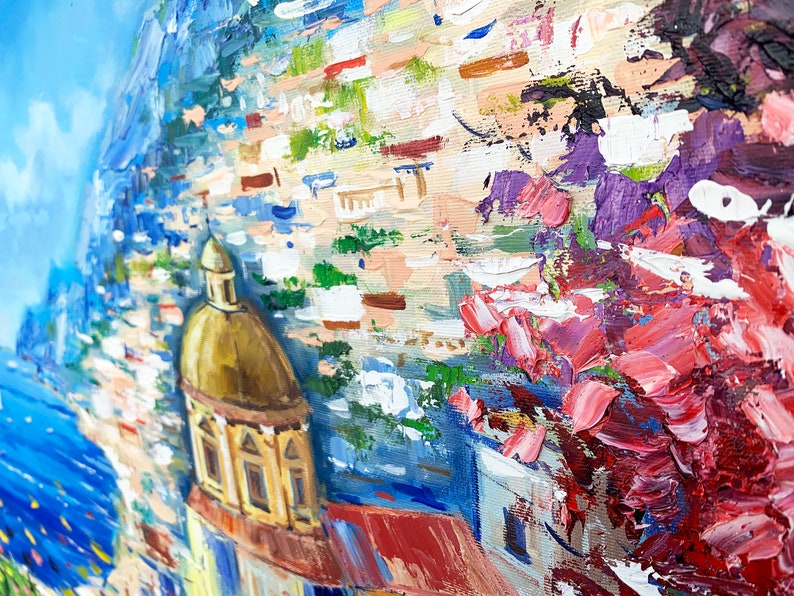 May include: A colorful oil painting depicting a cityscape with a large, golden-domed building in the foreground. The building is surrounded by colorful houses and a blue sky with white clouds. The painting is done in a loose, impressionistic style.