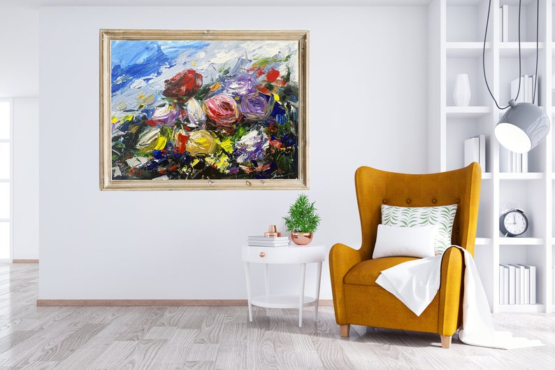 May include: A framed abstract painting of a colorful bouquet of flowers in shades of red, pink, purple, yellow, and blue. The flowers are painted with thick brushstrokes and appear to be in a field with a blue sky in the background.