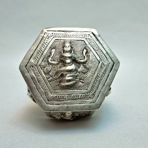 Antique Indian hexagonal repousse silver box with hinged lid depicting various dancing figures on all sides, ideal little trinket box.