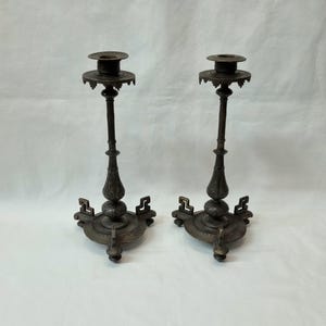 Pair of antique European (probably French) bronze-patinated &#39;white metal&#39; candlesticks with arguably a little Far Eastern design influence.