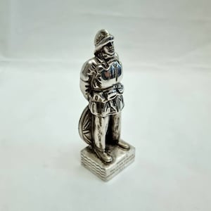 Lifeboat service collectable - a vintage silvered brass service presentation statue for lifeboat service 1955.