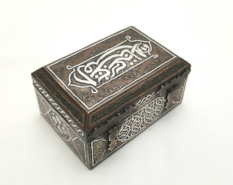 Antique Islamic casket - a small Middle Eastern Islamic brass box with silver & copper overlay in the manner of Cairoware.