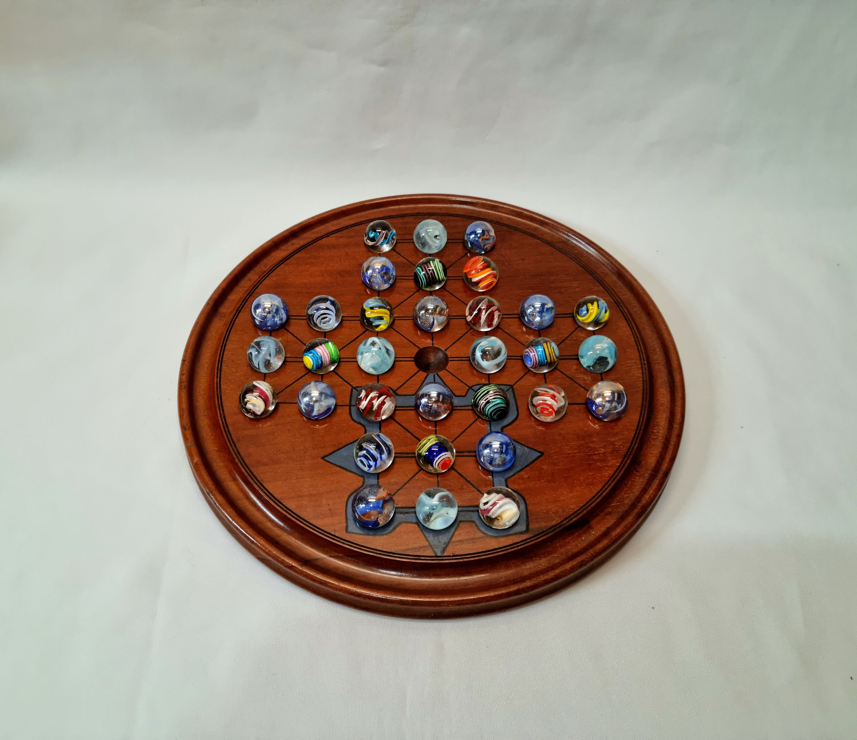 Solid Wood Solitaire with Blue Glass Marbles – 8.875 in. Diameter – Wood  Expressions