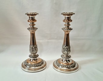 Antique candle holders - a pair of Regency early 19th Century Old Sheffield Plate, silver plated (on copper) candlesticks of good weight.