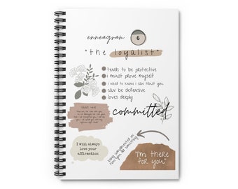 May include: A white notebook with a brown and white floral design. The notebook has a spiral binding and the text "enneagram 6 "the loyalist" " on the cover. The notebook also has the text "committed" and "I will always love your affirmation" on the cover.
