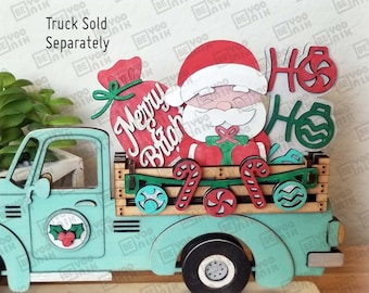 May include: A teal blue toy truck with a wooden bed carrying a Santa Claus figure, a bag with the words "Merry & Bright", and candy canes. The truck has a holly design on the side. The image includes the text "Laser Cut Files", "SVG", "PDF", "Digital File", and "Miniature version fits the truck".