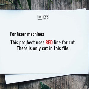 Op de afbeelding: Een wit vel papier met de tekst "For laser machines This project uses RED line for cut. There is only cut in this file." erop gedrukt.