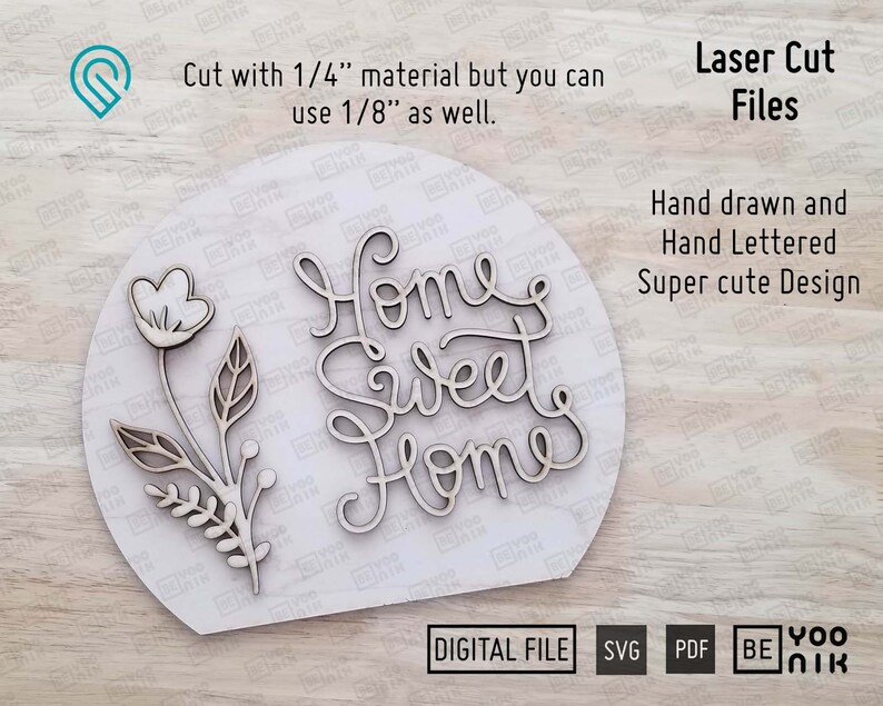 May include: A laser cut wooden sign with the text "Home Sweet Home" in a cursive font. The sign also features a small floral design with a single flower and leaves. The sign is on a white background and the text "Laser Cut Files" is in the top right corner.