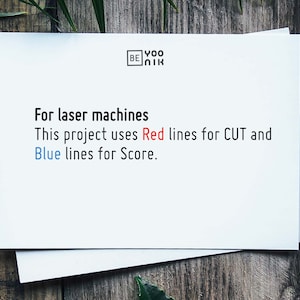 Puede incluir: Una hoja de papel blanca con el texto "For laser machines This project uses Red lines for CUT and Blue lines for Score." impreso en ella.