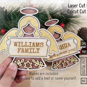 Peut inclure: Deux ornements d'ange en bois avec une auréole et des ailes dorées. Les ornements ont une pancarte qui dit "WILLIAMS FAMILY" et "SHUA God loves you!"  Les fichiers de découpe laser et les fichiers de découpe Cricut sont inclus.