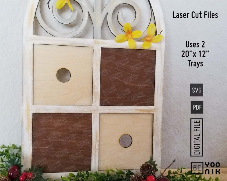 Op de afbeelding: Een wit houten wandrek met een decoratieve boog en vier vierkante vakken. Het rek is versierd met gele bloemen en heeft twee gaten aan de voorkant. De tekst "Laser Cut Files" is in zwart op een witte achtergrond gedrukt. De tekst "Uses 2 20" x 12" Trays" is in zwart op een witte achtergrond gedrukt. De tekst "SVG" en "PDF" is in zwart op een witte achtergrond gedruckt. De tekst "DIGITAL FILE" is in zwart op een witte achtergrond gedruckt. De tekst "BE YOO NIK" is in zwart op een witte achtergrond gedruckt.