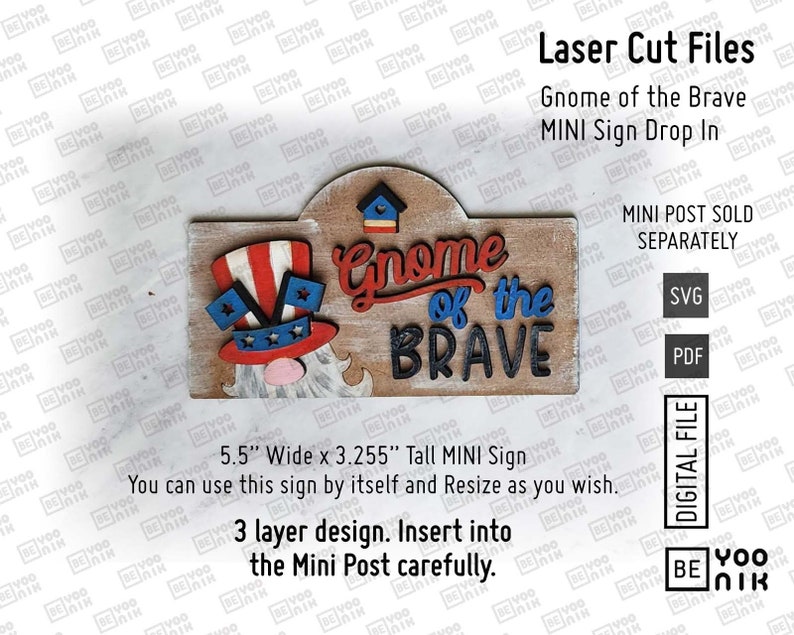 May include: A 3-layer laser cut design for a wooden sign that says "Gnome of the Brave". The sign is 5.5 inches wide and 3.255 inches tall. It features a gnome wearing a red, white, and blue hat with stars and stripes. The sign is designed to fit into a mini post, sold separately.