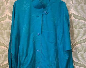 turquoise green jacket