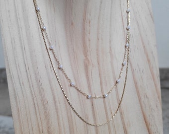 Fine double row necklace and adjustable stainless steel beads.