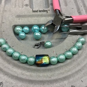 Reserved for Monica Priddy Restringing bracelets service