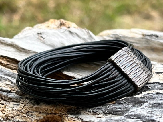 Tous leather hotsell bracelet