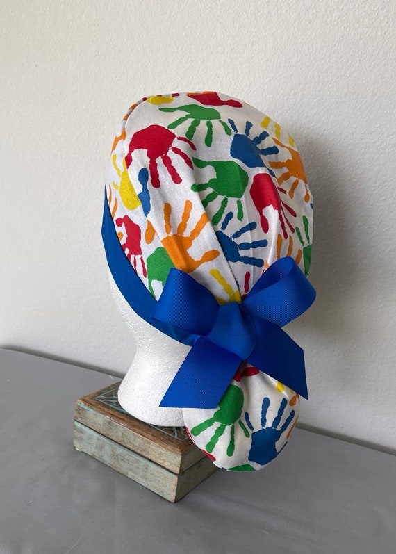 Avengers Ponytail Scrub Hat: Pediatric Nurse, Adjustable Buttons.